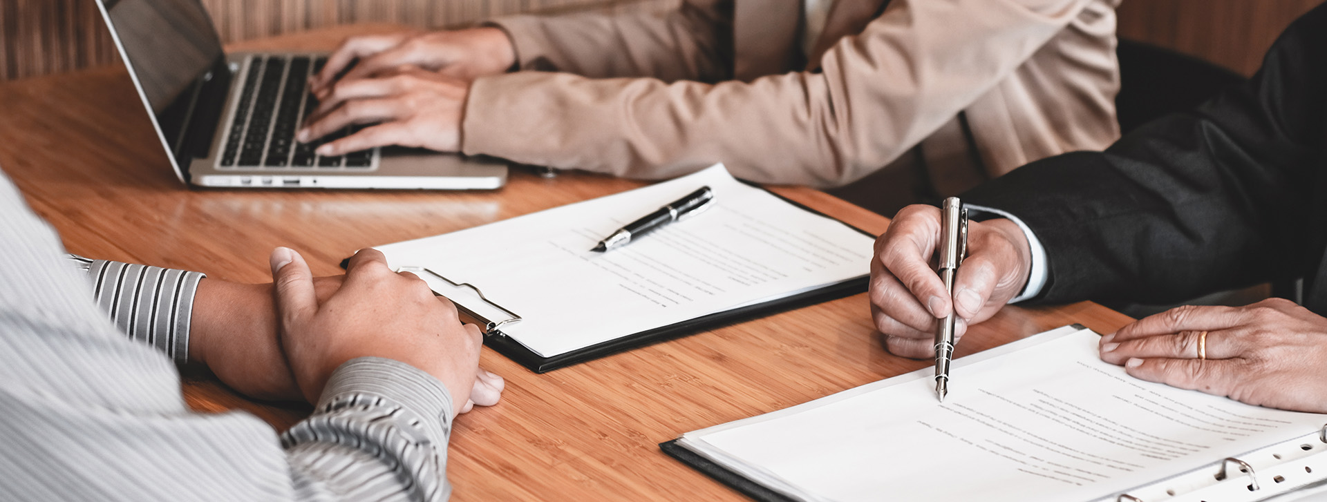 examiner-reading-a-document-during-job-interview